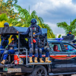 Tactical Police Convoy in Tropical Setting
