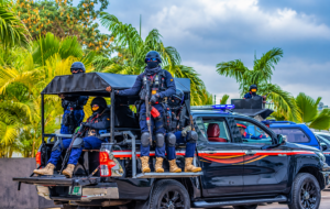 Tactical Police Convoy in Tropical Setting