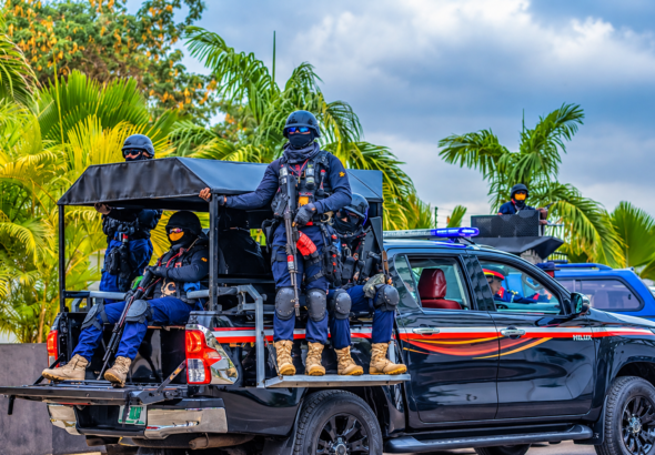 Tactical Police Convoy in Tropical Setting